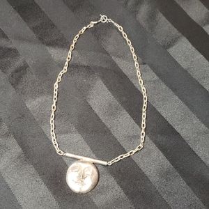 Unique face necklace. Purchased at a Festival
